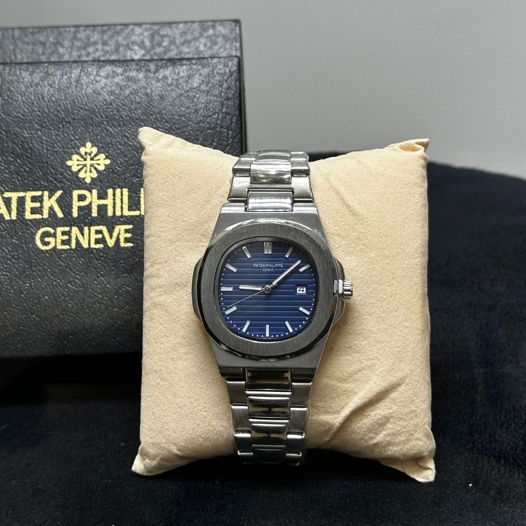 Patek Philippe – bracelet argenté, cadran bleu + packaging complet